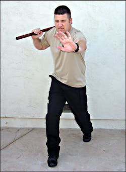 The gun side forward stance enables you to generate more power and maximizes your reach advantage. The off-hand can be used to prevent the suspect from closing in.