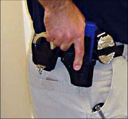The draw stroke sequence begins with a solid three finger grip of the pistol in the holster.