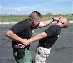 One effective technique for retaining your holstered firearm is to secure the wrist and strike the face.