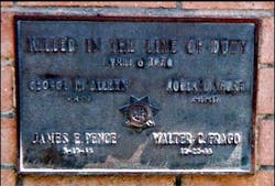 The plaque on the monument to the four CHP officers killed in the Newhall Incident. The plaque on the monument to the four CHP officers killed in the Newhall Incident.