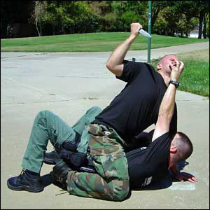 Rather than 'defend' against the knife, 'attack' the person trying to stab you with it!