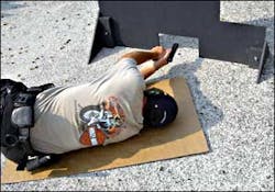 Is the training relevant? Here officer trains in shooting under low cover such as a vehicle.