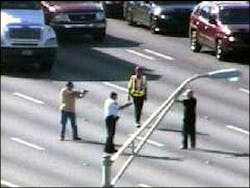 Manblockingtraffictaseredbyflo 10249272 Manblockingtraffictaseredbyflo 10249272