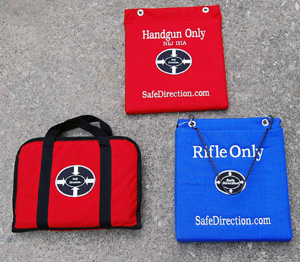 Ballistic Containment Systems from Safe Direction. Shown are the Pistol Transport Case for armorers. The composite wall board for pistols and the new composite wall board for rifles.