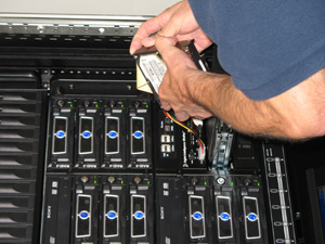 Detective Luis Ordonez working at the CFU's Forensic Server.