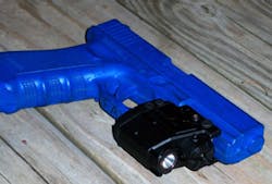 The X5L mounted on a Glock 17 blue gun The X5L mounted on a Glock 17 blue gun