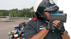 Traffic Officer Mitch Lee of the Grand Prairie (Texas) PD demonstrates the DBC-equipped Laser Tech Ultra Lyte Lidar device, which can calculate accurate measurements between vehicles, both in distance and time. Traffic Officer Mitch Lee of the Grand Prairie (Texas) PD demonstrates the DBC-equipped Laser Tech Ultra Lyte Lidar device, which can calculate accurate measurements between vehicles, both in distance and time.
