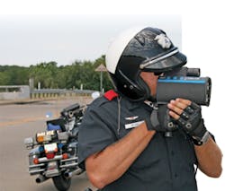 Traffic Officer Mitch Lee of the Grand Prairie (Texas) PD demonstrates the DBC-equipped Laser Tech Ultra Lyte Lidar device, which can calculate accurate measurements between vehicles, both in distance and time. Traffic Officer Mitch Lee of the Grand Prairie (Texas) PD demonstrates the DBC-equipped Laser Tech Ultra Lyte Lidar device, which can calculate accurate measurements between vehicles, both in distance and time.