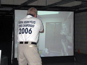 John Wills performing on a simulator. As a trainer he emphasizes the need for positive feedback as well as critical debrief.