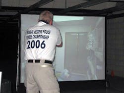 John Wills performing on a simulator. As a trainer he emphasizes the need for positive feedback as well as critical debrief.