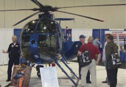 Enforcement Expo Great Lakes 2008, attendees gather for a helicopter display.