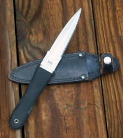 The SOG Knives&apos; Pentagon w/ original leather sheath.
