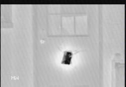 This picture shows an ice pack on a side door. The temperature was almost 94 degrees. Despite the hot temperature, we can see the door marked clearly using the thermal imager.