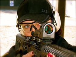 Sgt. Sanela Latarski, FRPD (NY). Photo shows incongruity of a competent officer aiming an AR-style rifle... with painted nails. Sgt. Sanela Latarski, FRPD (NY). Photo shows incongruity of a competent officer aiming an AR-style rifle... with painted nails.