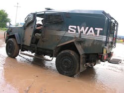 An earlier version of the TPV on the Oshkosh test-drive course in July. Knurr says the 13-ton military-grade protected TPV 'drives and handles like an automobile.' An earlier version of the TPV on the Oshkosh test-drive course in July. Knurr says the 13-ton military-grade protected TPV 'drives and handles like an automobile.'