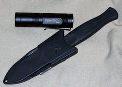 The sheath is synthetic with a clip for belt / boot / vest attachment, and an adjustable retention system. The sheath is synthetic with a clip for belt / boot / vest attachment, and an adjustable retention system.