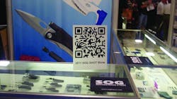 A mobile barcode on display at the 2011 SHOT Show for attendees to scan with a smartphone for online information from SOG Knives. A mobile barcode on display at the 2011 SHOT Show for attendees to scan with a smartphone for online information from SOG Knives.