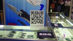 A mobile barcode on display at the 2011 SHOT Show for attendees to scan with a smartphone for online information from SOG Knives.