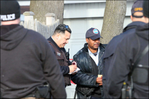 Chicago police investigate the scene near 75th Street and South Constance Avenue where two students were shot.