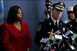 Camden Police Chief Scott Thomson answers a question after Mayor Dana Redd, left, announced the city will rehire 50 officers. Camden Police Chief Scott Thomson answers a question after Mayor Dana Redd, left, announced the city will rehire 50 officers.