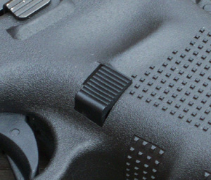 The Gen 4 magazine catch/release is enlarged and stands out a bit more. It's easier to operate in the author's opinion.