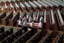 The honor guard takes the American Flag draped casket out for its departure at the end of the funeral for Officer David Crawford. The honor guard takes the American Flag draped casket out for its departure at the end of the funeral for Officer David Crawford.