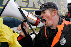 Correctional Officer Darrin Norton leads other officers during a demonstration for safer working conditions.