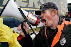Correctional Officer Darrin Norton leads other officers during a demonstration for safer working conditions. Correctional Officer Darrin Norton leads other officers during a demonstration for safer working conditions.