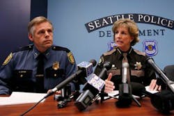 King Count Sheriff Sue Rahr, center, addresses a news conference with Seattle Police Department Assistant Chief Mike Sanford, left. King Count Sheriff Sue Rahr, center, addresses a news conference with Seattle Police Department Assistant Chief Mike Sanford, left.