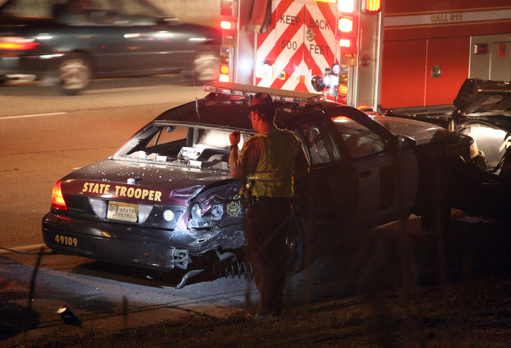 A Minnesota state trooper's cruiser is seen after it was rear-ended by a van while at a traffic stop on April 2.