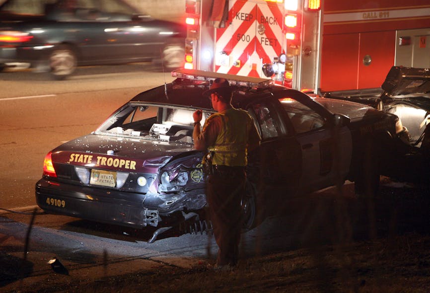 A Minnesota state trooper&apos;s cruiser is seen after it was rear-ended by a van while at a traffic stop on April 2.