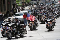 Participants in the Blue Valor Run make their way onto West St. at the start of the first annual Blue Valor Run. Participants in the Blue Valor Run make their way onto West St. at the start of the first annual Blue Valor Run.