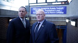 SEPTA Officer Michael Sylvester and FBI Agent Joe Metzinger stand at a subway entrance in Philadelphia. SEPTA Officer Michael Sylvester and FBI Agent Joe Metzinger stand at a subway entrance in Philadelphia.