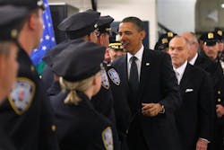 President Barack Obama, accompanied by Police Commissioner Raymond Kelly, and others, meets with officers at the First Precinct. President Barack Obama, accompanied by Police Commissioner Raymond Kelly, and others, meets with officers at the First Precinct.
