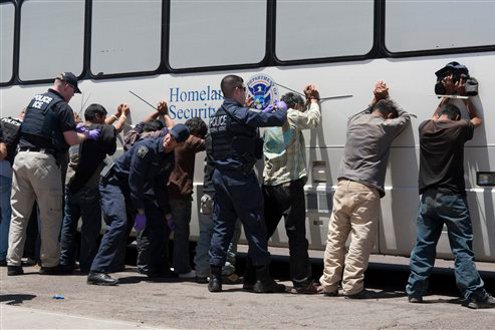 ICE agents capture undocumented immigrants in west Phoenix.