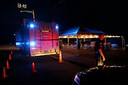 Tuscaloosa Police Sgt. Brent Blankley arrives at a command post as part of nighttime security during a curfew called following last Wednesday's tornado. Tuscaloosa Police Sgt. Brent Blankley arrives at a command post as part of nighttime security during a curfew called following last Wednesday's tornado.