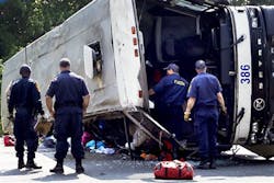 The Virginia State Police Accident Reconstruction Team and Motor Carrier Safety Team inspect a bus that was involved in a single-vehicle accident. The Virginia State Police Accident Reconstruction Team and Motor Carrier Safety Team inspect a bus that was involved in a single-vehicle accident.