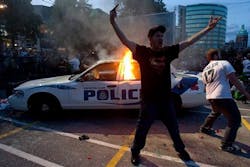 A police car burns during a riot in downtown Vancouver, British Columbia on June 15. A police car burns during a riot in downtown Vancouver, British Columbia on June 15.