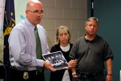Capt. Joe Qualters of the Bloomington Police department displays a photo of a vehicle seen in the area taken by a video surveillance camera on the night Lauren Spierer disappeared. Capt. Joe Qualters of the Bloomington Police department displays a photo of a vehicle seen in the area taken by a video surveillance camera on the night Lauren Spierer disappeared.