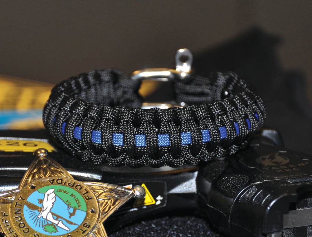 Blue Line Survival Straps, made for police and supporters, pack approximately 1.75 feet per every inch of wrist size.