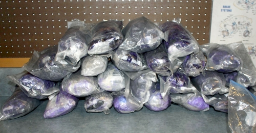 Police seized 76 pounds of black tar heroin Monday following a SWAT standoff.