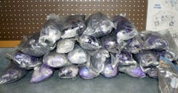 Police seized 76 pounds of black tar heroin Monday following a SWAT standoff. Police seized 76 pounds of black tar heroin Monday following a SWAT standoff.