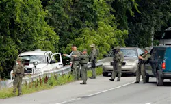 Law enforcement officials prepare to search the woods on Baltimore-Washington Parkway in Linthicum. Law enforcement officials prepare to search the woods on Baltimore-Washington Parkway in Linthicum.