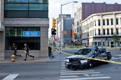 A Grand Rapids police car that was both hit and fired upon sits on the corner of Division and Fulton in Grand Rapids. A Grand Rapids police car that was both hit and fired upon sits on the corner of Division and Fulton in Grand Rapids.