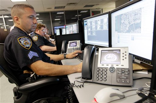 Police officers work in the operations center of the Lower Manhattan Security Coordination Center.