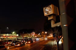A red light camera is shown at La Brea Ave. and Santa Monica Blvd. in Los Angeles.