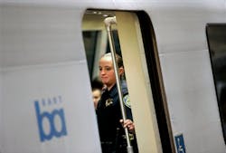 A BART transit police officer rides a train though San Francisco's Civic Center station on Aug. 13. A BART transit police officer rides a train though San Francisco's Civic Center station on Aug. 13.