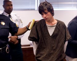 Jared Cano, 17, is led out of the courtroom in Tampa, Fla. on Aug. 17. Jared Cano, 17, is led out of the courtroom in Tampa, Fla. on Aug. 17.
