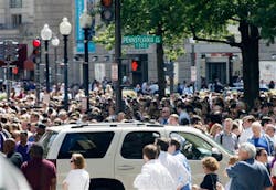 People crowd Pennsylvania Avenue in Washington as buildings were evacuated following an earthquake. People crowd Pennsylvania Avenue in Washington as buildings were evacuated following an earthquake.