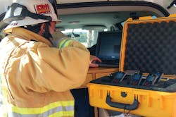 A first responder utilizes the Sprint ERT Go-Kit for emergency communications. A first responder utilizes the Sprint ERT Go-Kit for emergency communications.
